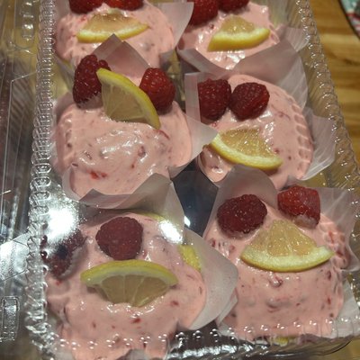 Lemon Cupcake With Raspberry Filling Topped With Raspberry Buttercream Frosting 
