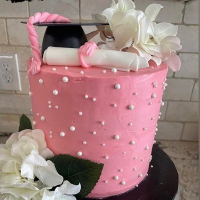 Tall Graduation Buttercream Cake With Flowers