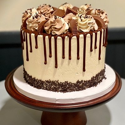 Signature item- Peanut Butter Cup Cake ( 3 Layers Of Chocolate Cake, Layered With Peanut Butter Buttercream And Peanut Butter Cup Pieces. Topped With Peanut Butter Buttercream, Dark Chocolate Ganache And Peanut Butter Cups (Available In 6”or 8”)