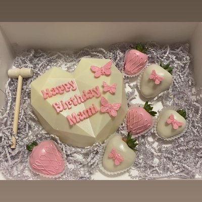 Breakable heart with strawberries 