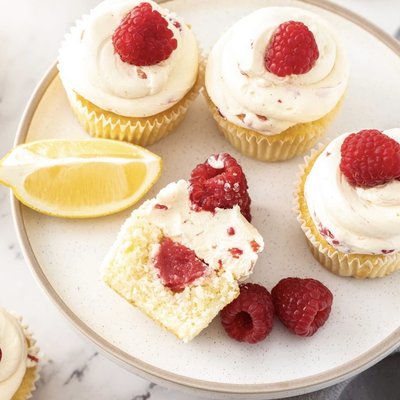 One Dozen Vanilla Cupcakes W/ Raspberry Filling