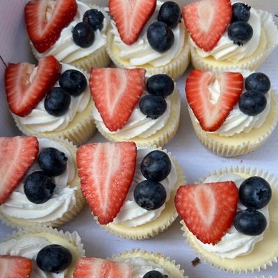 Cheesecake Bites With Whipped Cream And Fruit 